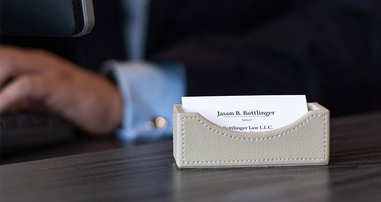 Jason Bottlinger business cards on desk